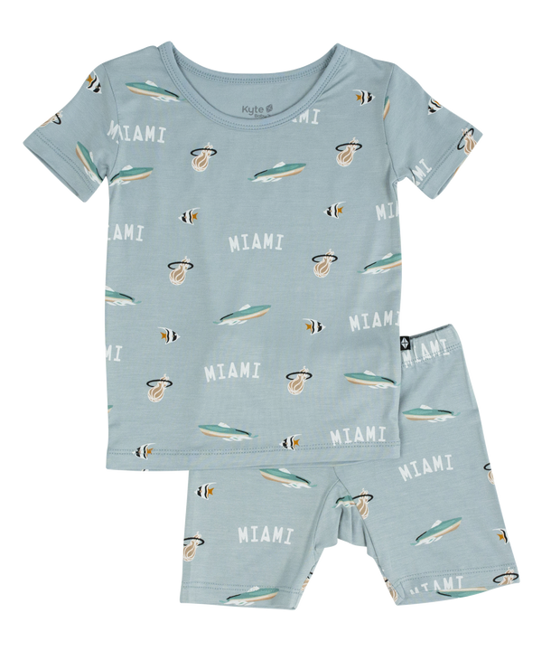 Toddler short sleeve PJ set in fog blue with Miami HEAT logo and surfboard prints. - Court Culture x Kyte Baby Nautical Fog Toddler Short Sleeve PJ Set
