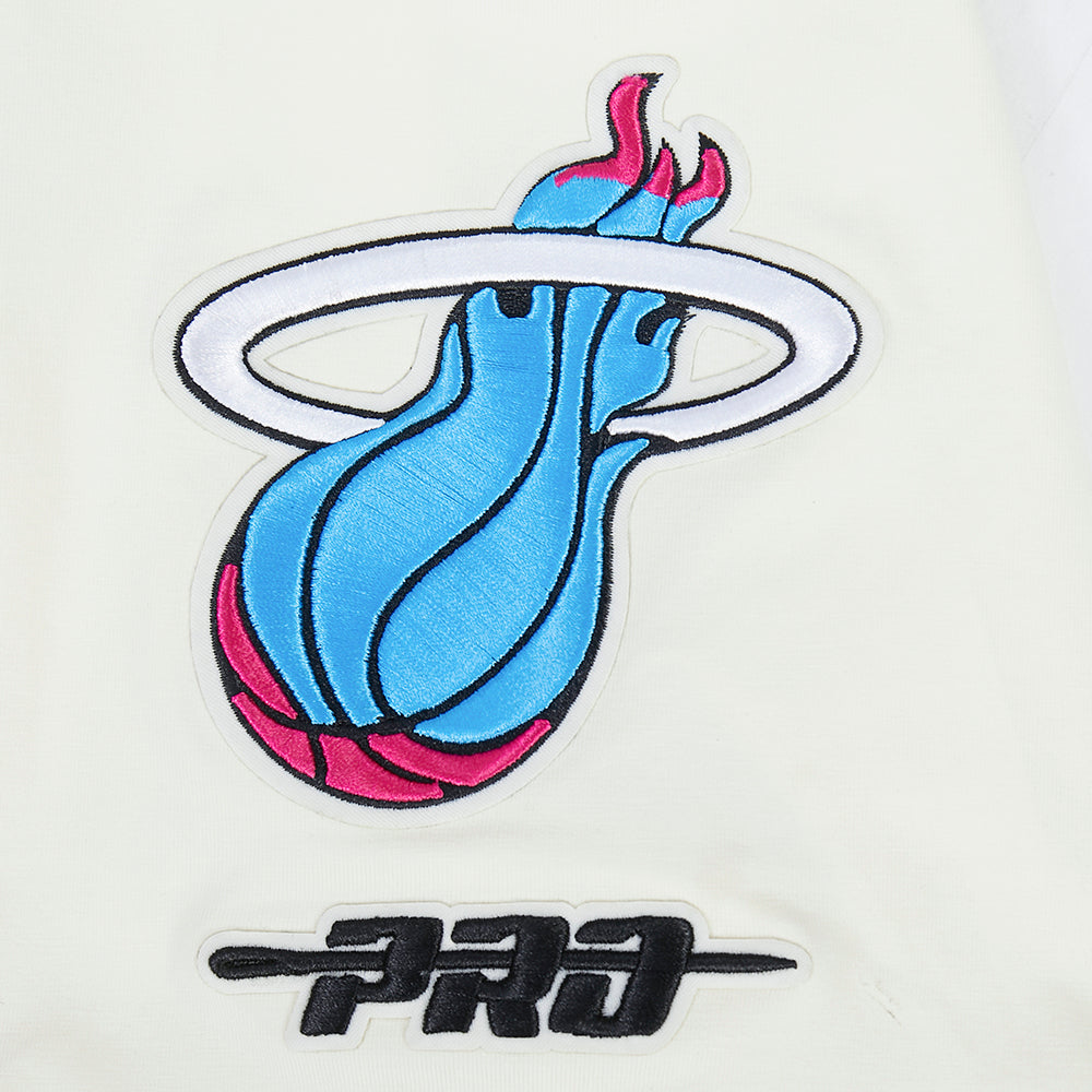 The Pro Standard Miami HEAT Original Vice Nights Logo Tee features a blue and pink flaming basketball logo with a white ring, 