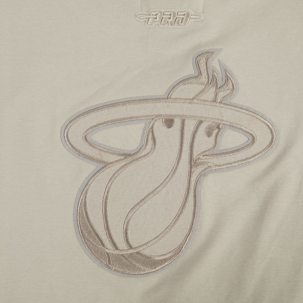 A beige and light gray embroidered Miami Heat logo decorates the Pro Standard Miami HEAT Original Vice Nights Beige Women's Boxy Tee. Crafted from light cotton spandex fabric. Wash with like colors to preserve the design.