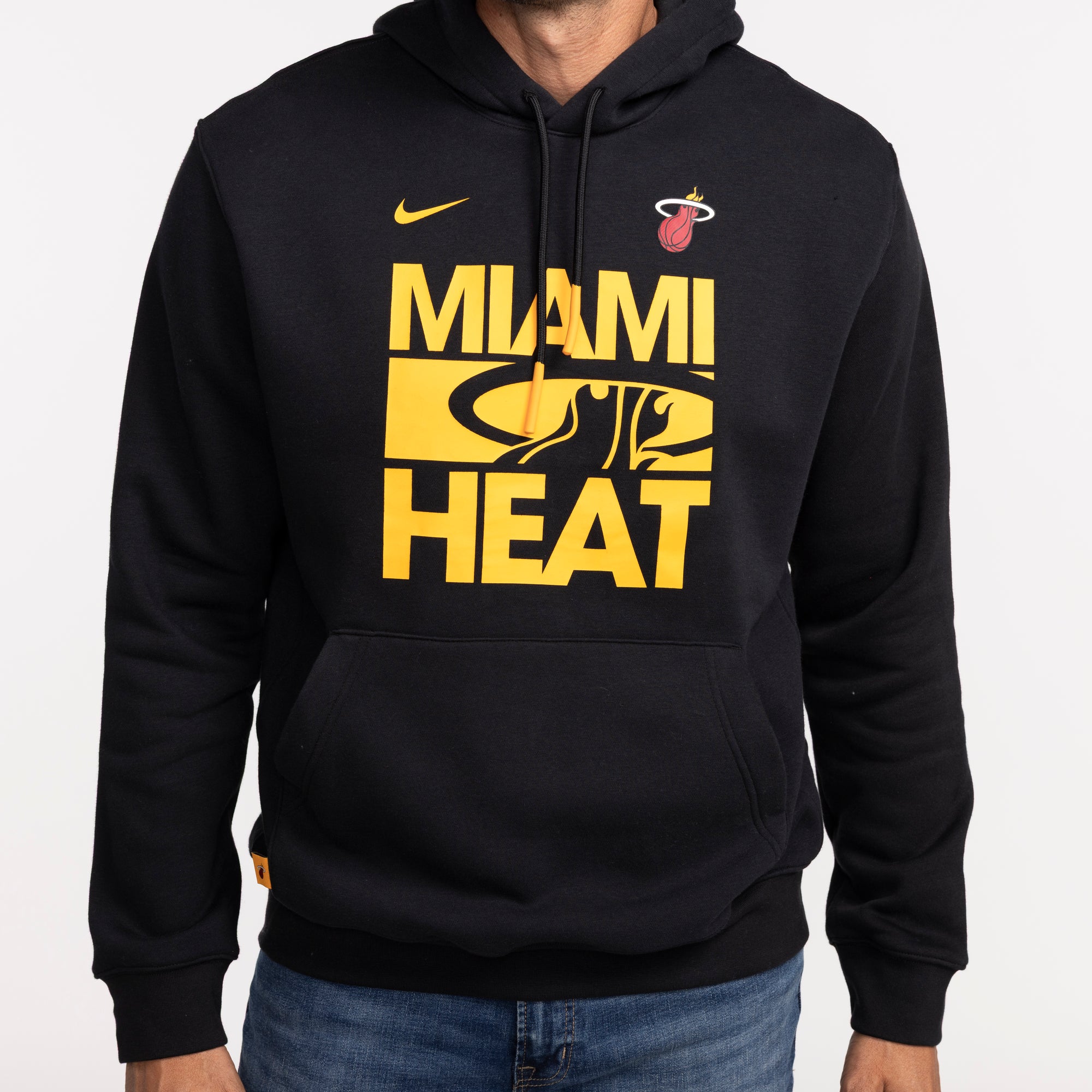 Black Nike pullover hoodie with yellow Miami HEAT wordmark and team logo on chest. - Nike Miami HEAT Club Wordmark Pullover Hoodie