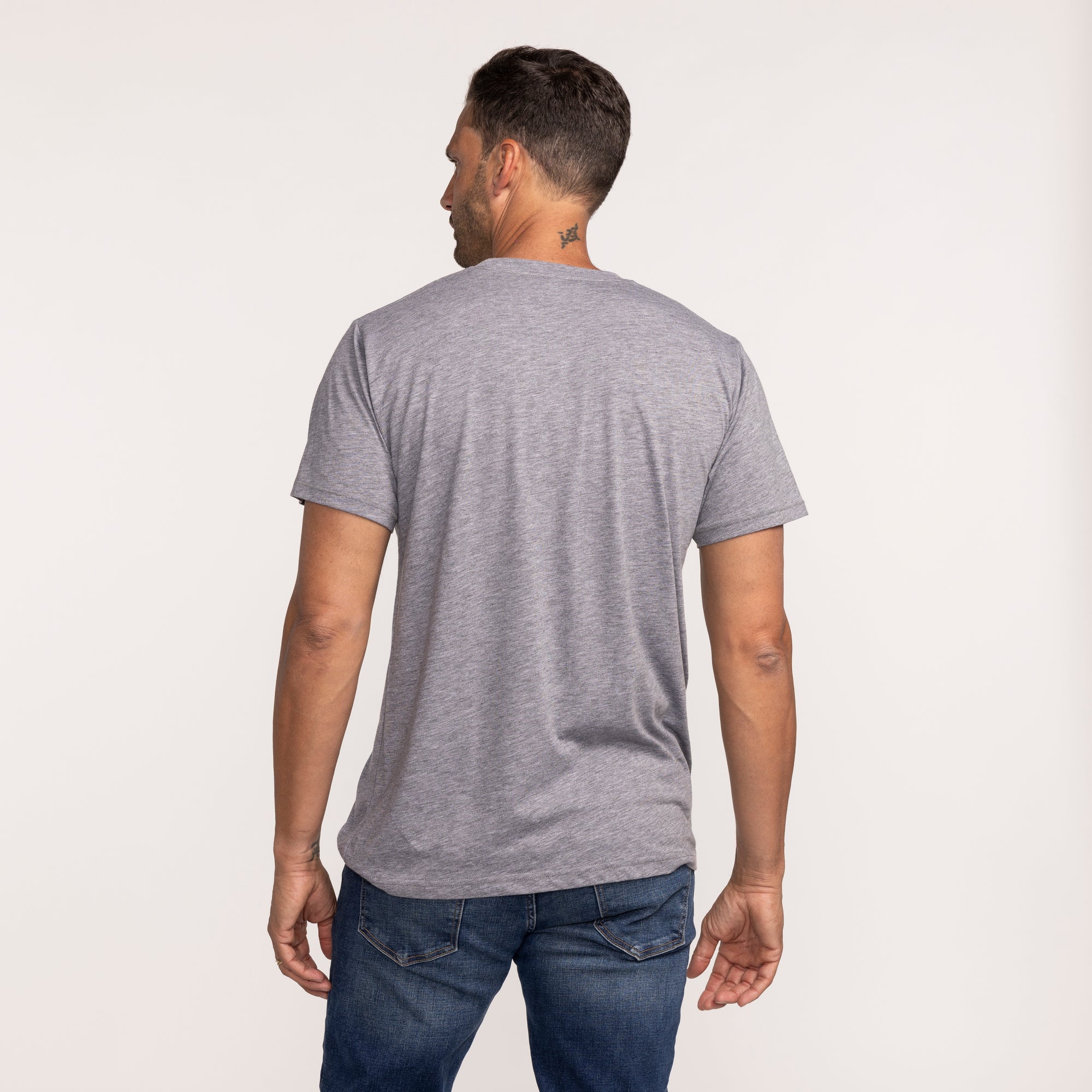 Gray short-sleeve Homage Miami HEAT Superman t-shirt shown from the back on a male model. - Homage Miami HEAT Superman Tee