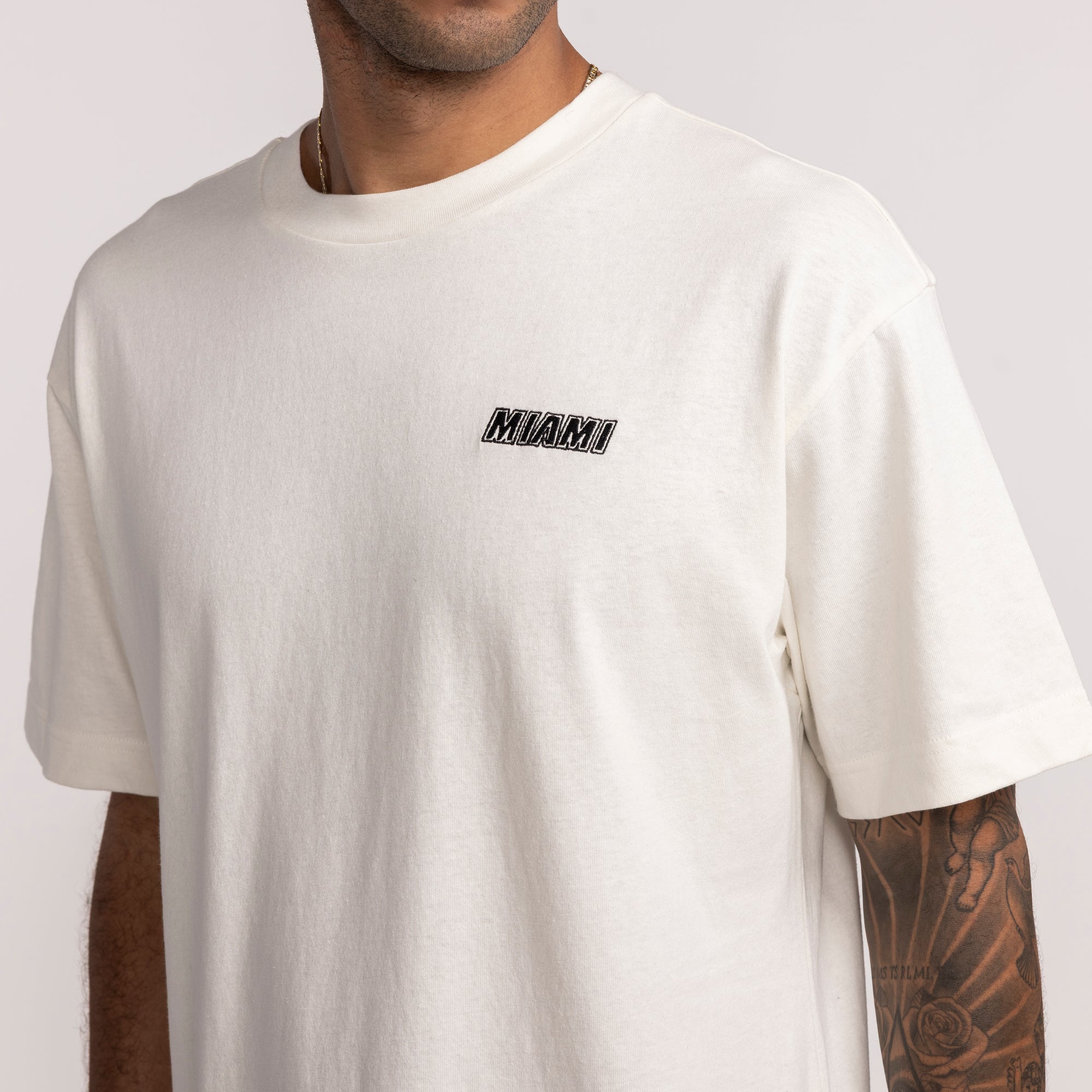 Cream-colored short-sleeve tee with Miami HEAT logo embroidered on chest, crew neck. - '47 Brand Miami HEAT Logo Foundation Tee