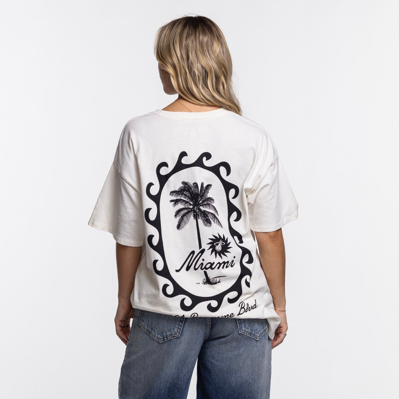 A person with blonde hair faces away, wearing the Court Culture Original Vice Nights 