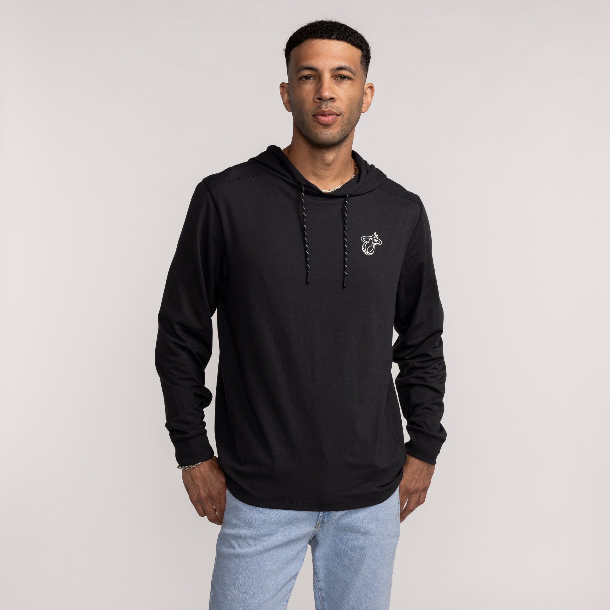 Black '47 Brand hoodie with Miami HEAT logo on left chest, long sleeves, and hood with drawstrings. - '47 Brand Miami HEAT Logo Forward Hoodie
