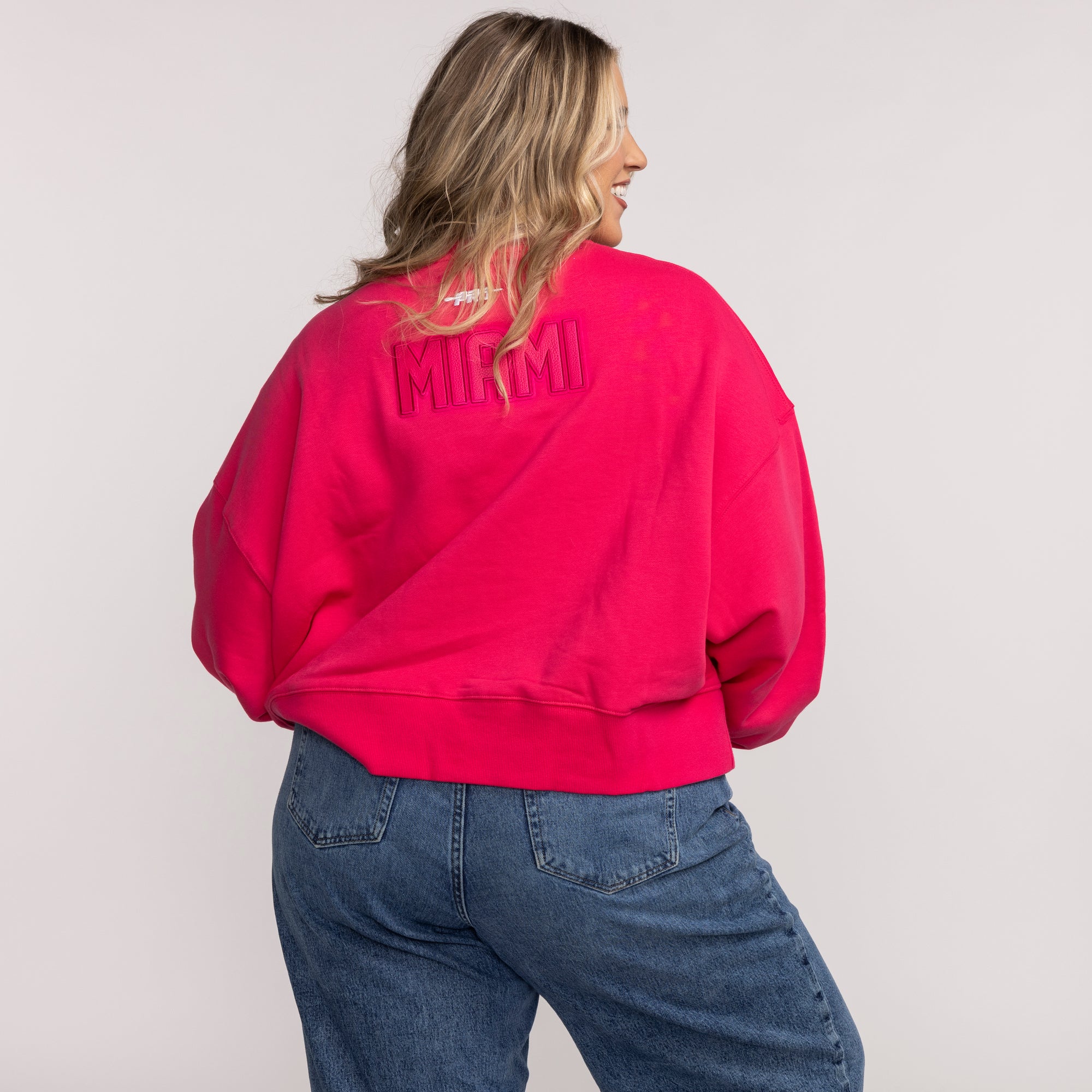 Vice pink Miami HEAT women's crewneck sweatshirt with ribbed hem and long sleeves, back view. - Pro Standard Miami HEAT Original Vice Pink Women's Crewneck