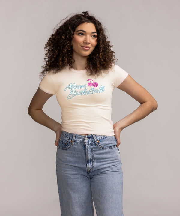 A person with curly brown hair wearing a white Court Culture Original Vice Nights 