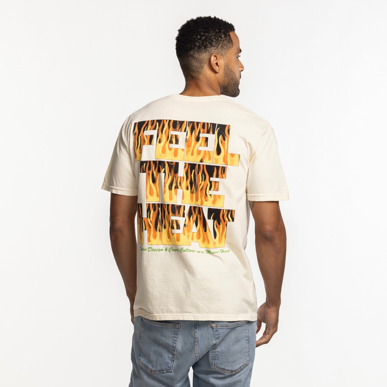 A man wears the Court Culture x Duvin Flames Tee, featuring 