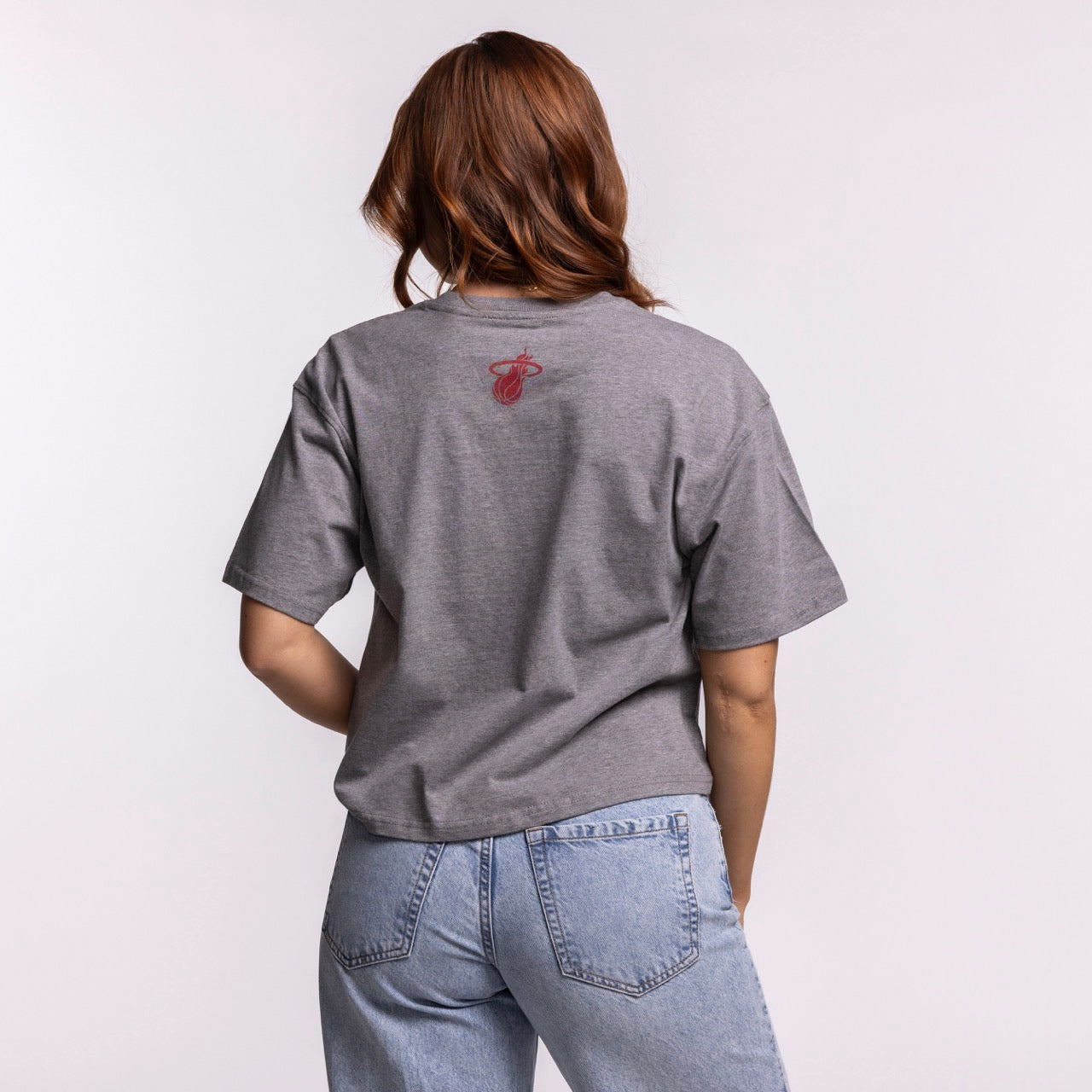 A person with long brown hair, wearing the Court Culture 