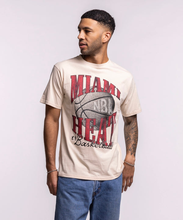 A man in a relaxed fit beige Court Culture 