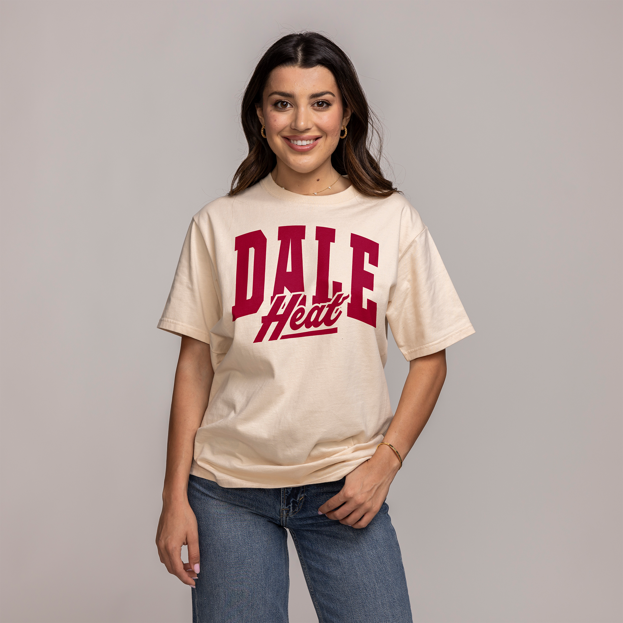 Cream-colored short-sleeve tee with bold red 