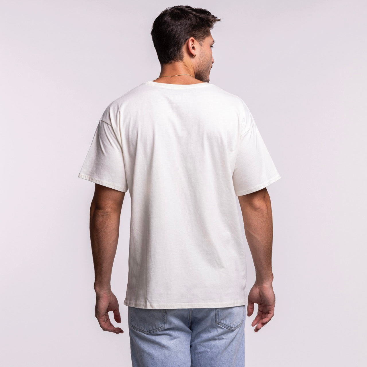 A man faces away from the camera, wearing the Court Culture Original Vice Nights 