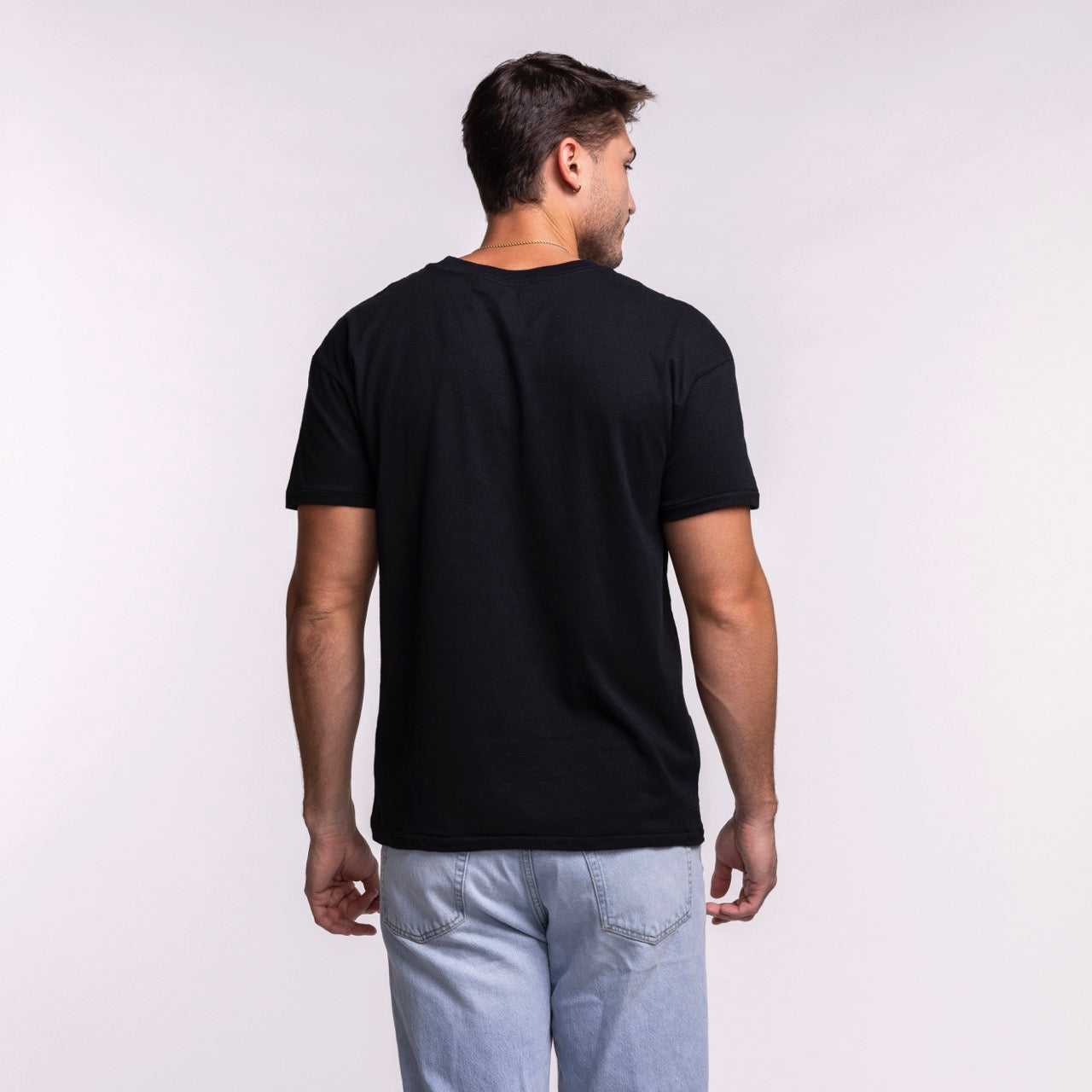 A man faces away from the camera, wearing a Court Culture Original Vice Nights 