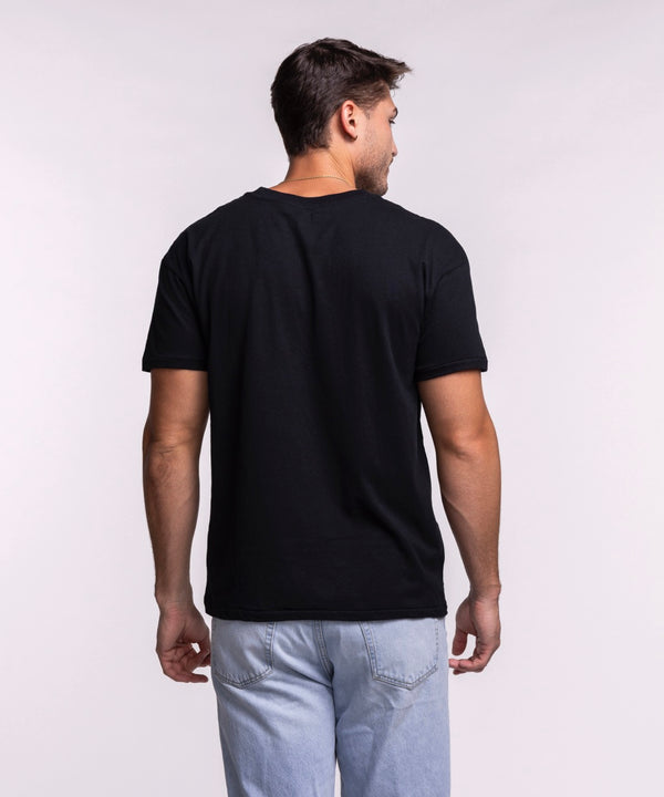 A man wearing light blue jeans and the Court Culture Original Vice Nights 