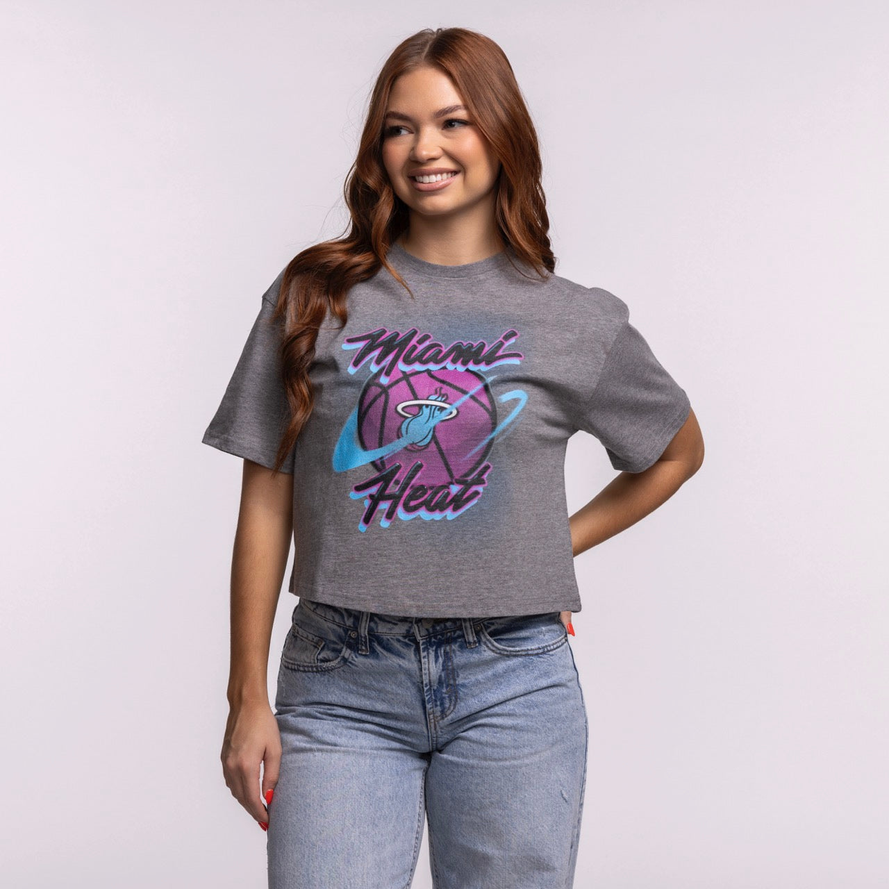 A smiling woman with long, wavy brown hair wears the Court Culture Original Vice Nights 