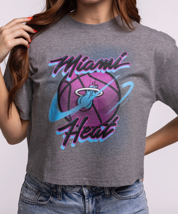 A woman with long auburn hair models the Court Culture Original Vice Nights 