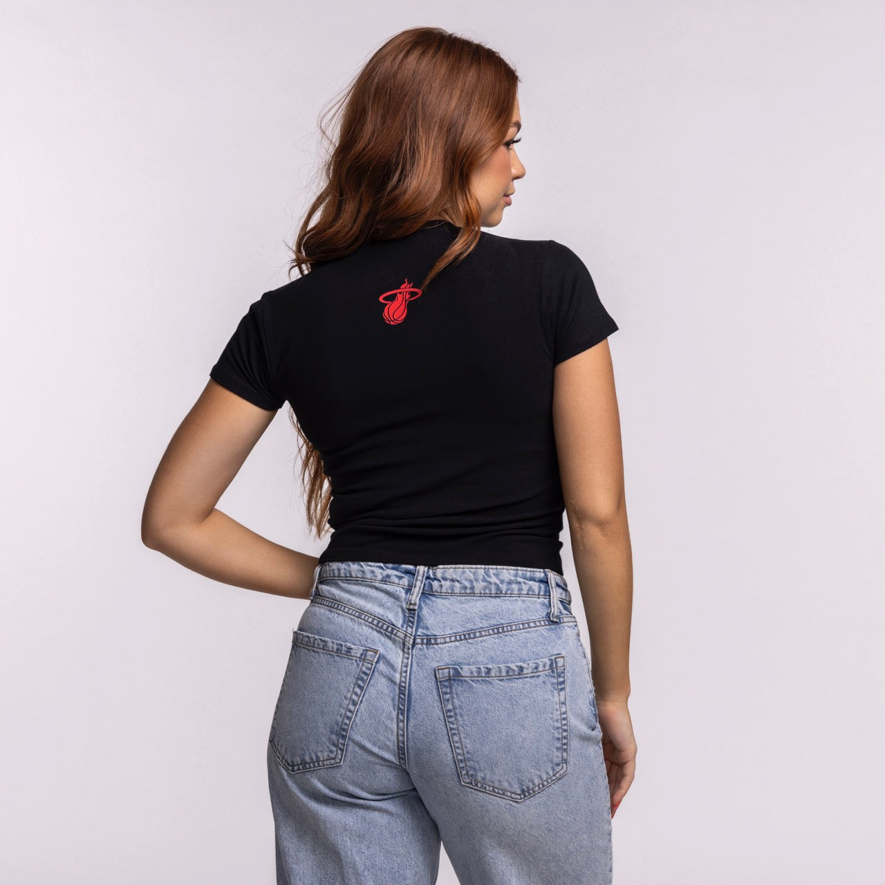 A woman with long brown hair, wearing the Court Culture 