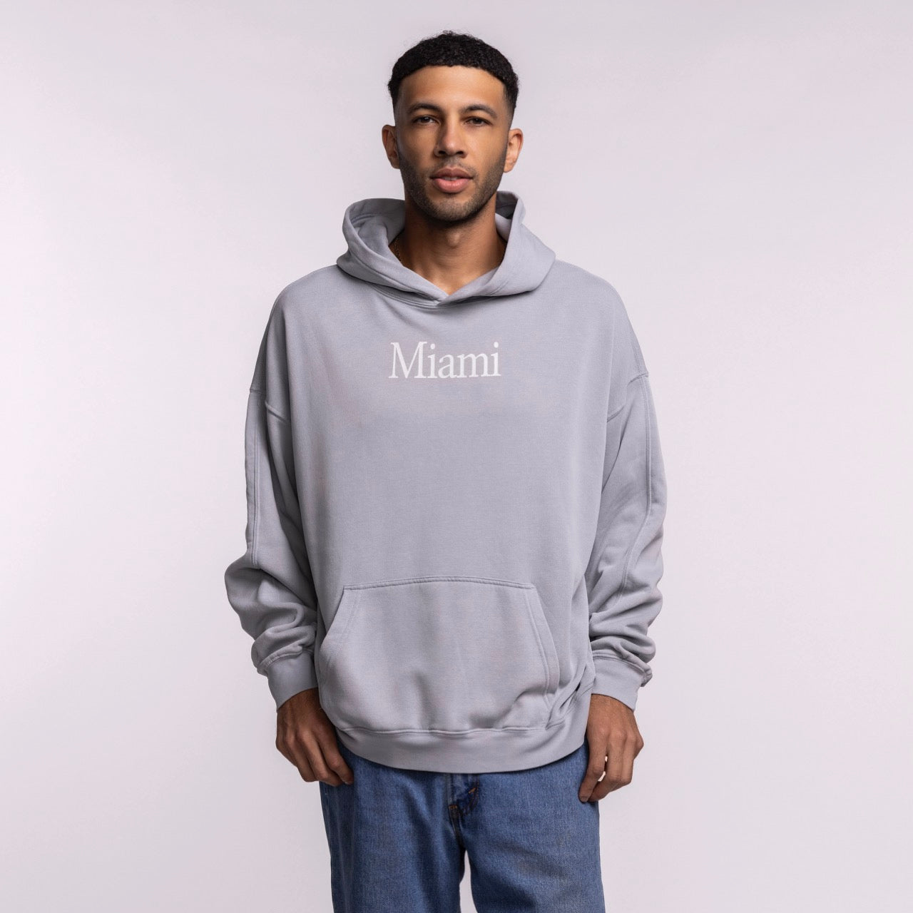 A man faces forward in a Court Culture 