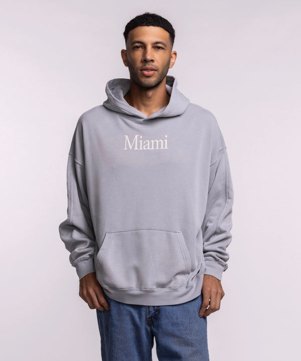 A man faces forward in a Court Culture 