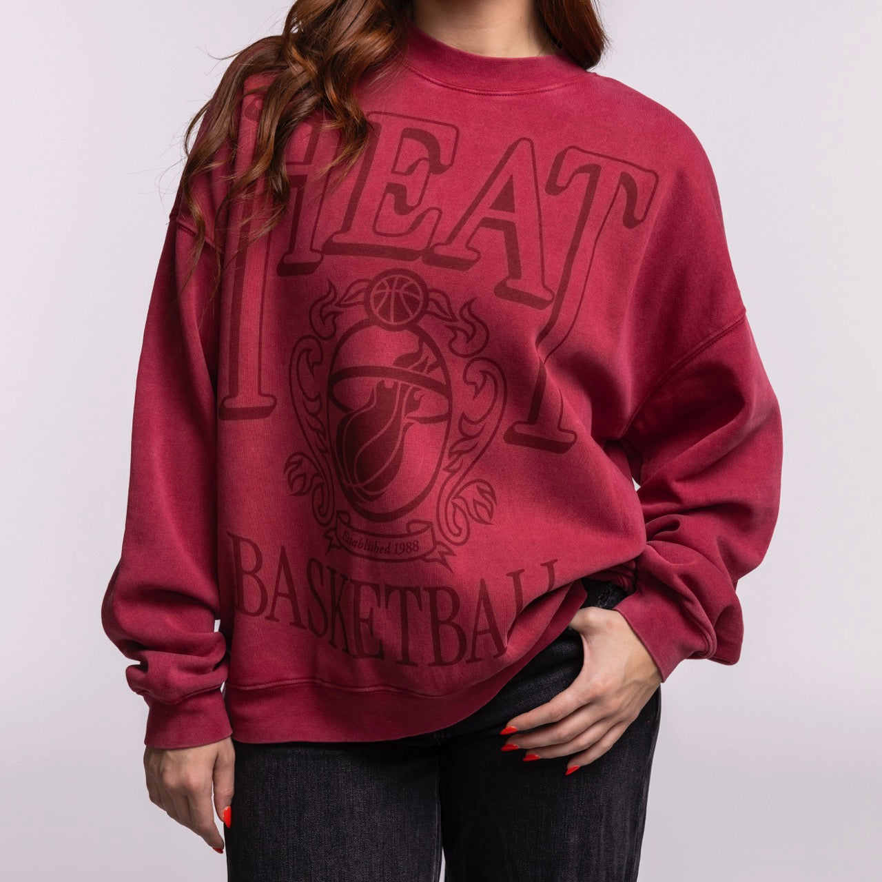 A woman wears the Court Culture 