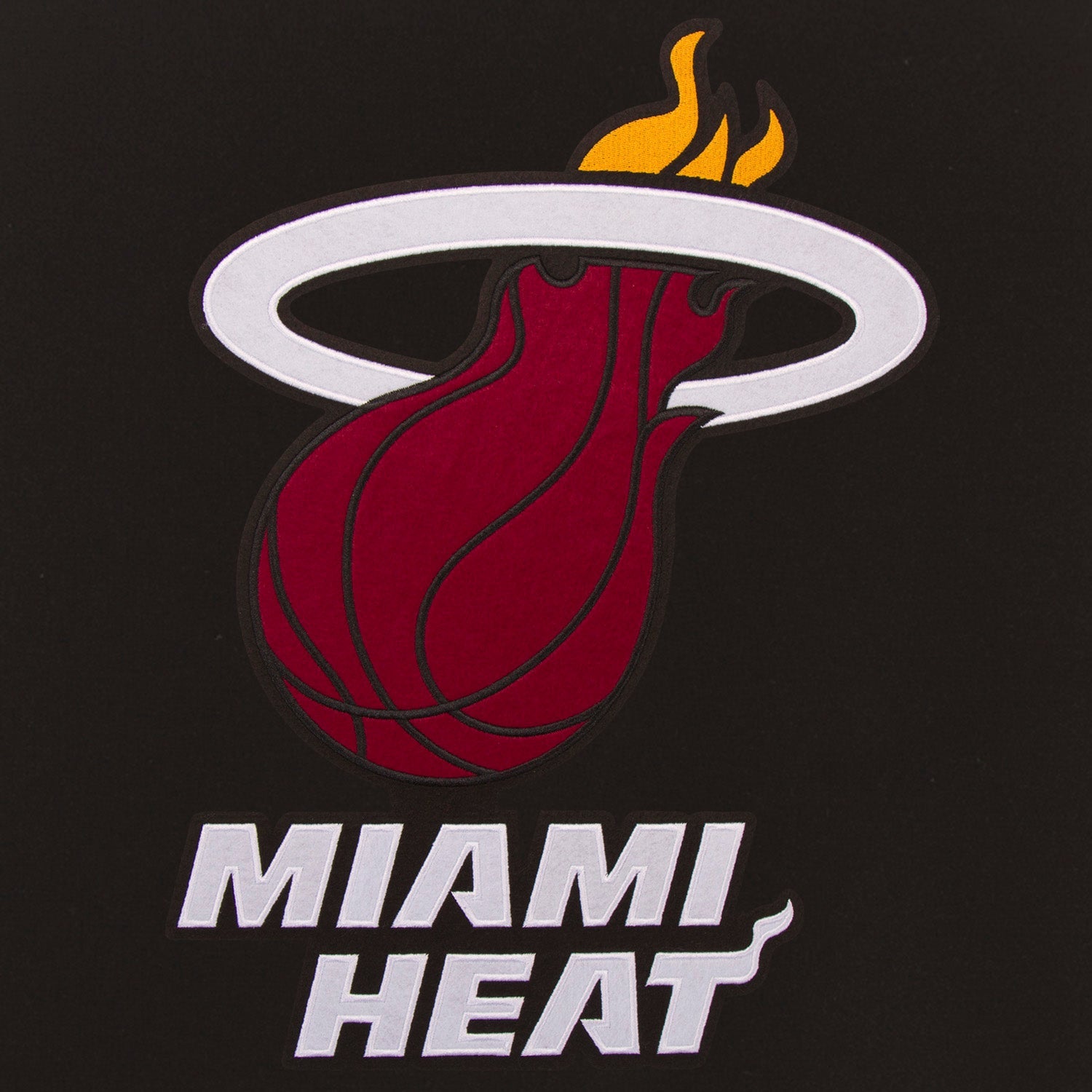 The JH Designs Miami HEAT Reversible Varsity Jacket features the iconic flaming basketball logo and bold MIAMI HEAT lettering—perfect for showcasing your team pride with its classic varsity style from JH Designs.