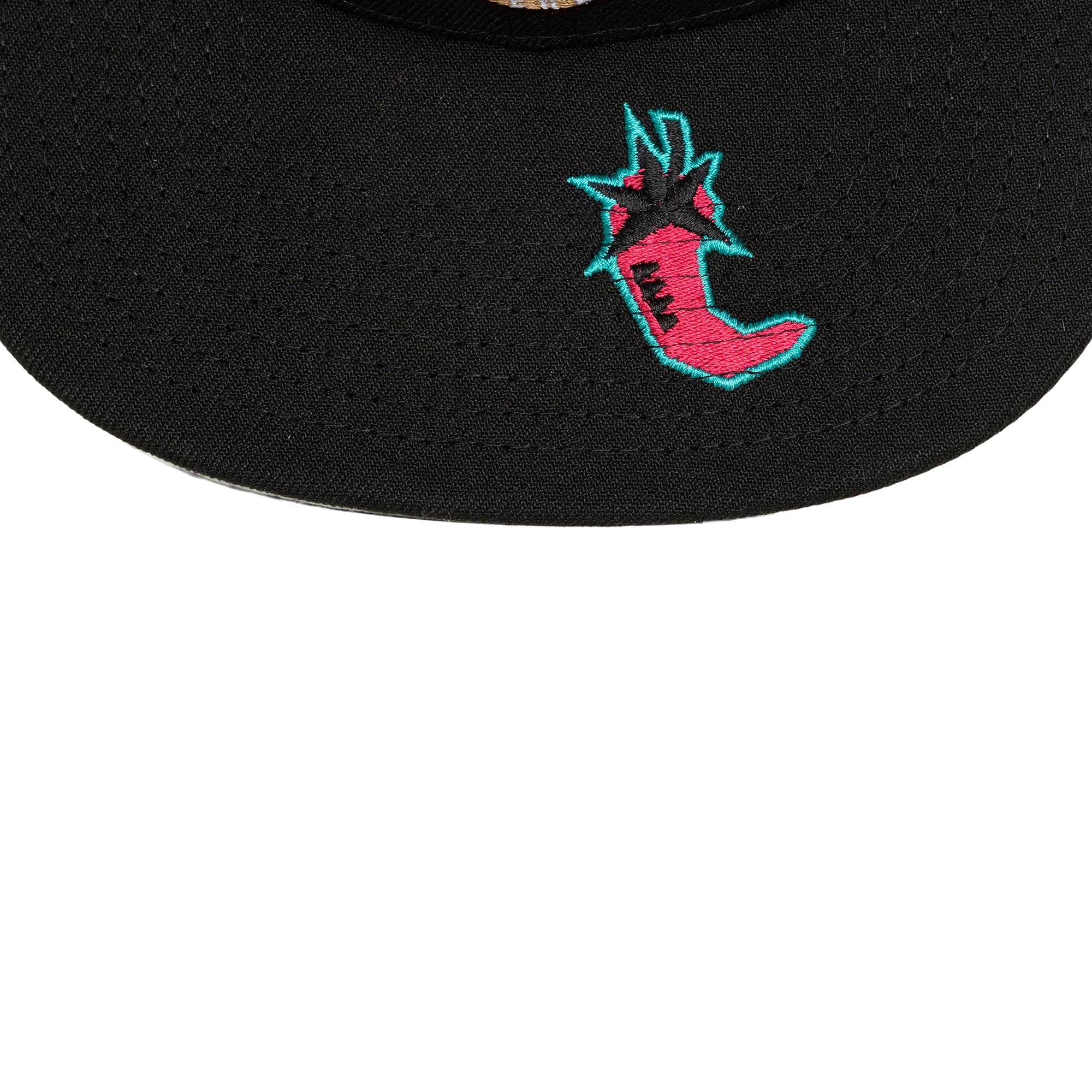 Close-up of the Mitchell & Ness Miami HEAT '96 All-Star Snapback. This black polyester hat features an embroidered pink and turquoise sneaker with a spiked heel motif. Plain white background. One size fits most; spot clean only.