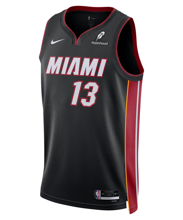The Bam Adebayo Nike Miami HEAT Icon Black Swingman Jersey features red and white MIAMI lettering, number 13 front, black collar, red/yellow side panels, moisture-wicking Dri-FIT tech, Robinhood logo on chest, and NBA tag at the hem.