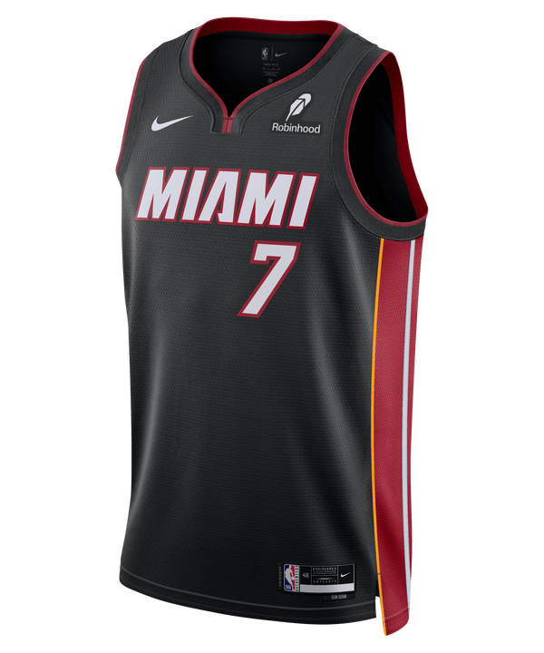 The Kel'el Ware Nike Miami HEAT Icon Black Swingman Jersey features red, white, and yellow side stripes, number 7, bold MIAMI lettering, Dri-FIT moisture-wicking tech, plus visible Nike and sponsor logos.