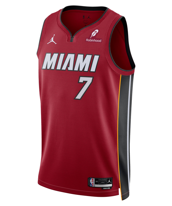 The Kel'el Ware Nike Jordan Brand Miami HEAT Statement Red Swingman Youth Jersey features number 7, gray and white MIAMI text, black/yellow side panels, Robinhood & Jordan Brand logos, and Dri-FIT moisture-wicking tech.