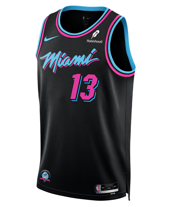 The Nike Bam Adebayo Original Vice Nights Youth Swingman Jersey features Miami's stylized script, number 13, sponsor and NBA logos, blue/pink trim, and sweat-wicking Dri-FIT tech for comfort.