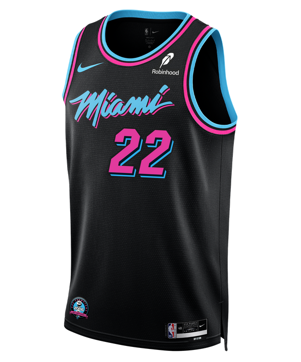 The Nike Andrew Wiggins Original Vice Nights Youth Swingman Jersey features black fabric with blue and pink trim, number 22, “Miami” in stylized font, multiple logos including Nike and Robinhood, and Dri-FIT technology for comfort.