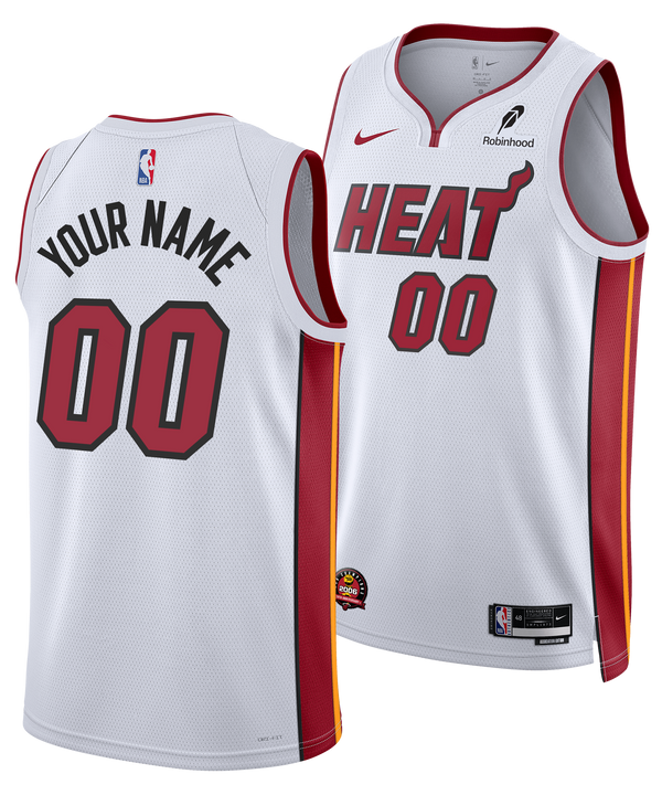 Two personalized Nike Miami HEAT Association White Swingman Jerseys featuring HEAT and 00 on the front, YOUR NAME and 00 on the back, red/yellow accents, plus an authentic 2006 NBA Championship patch for dedicated fans.