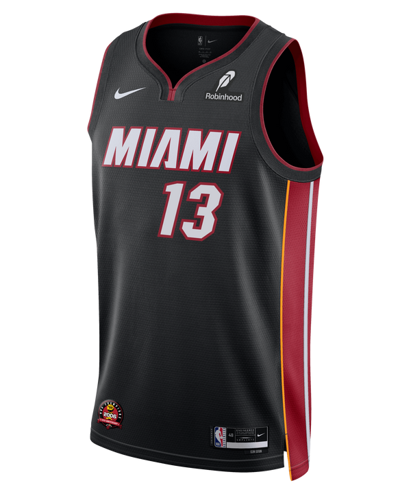 The Bam Adebayo Nike Miami HEAT Icon Black Swingman Jersey features red and white MIAMI text, number 13, red/yellow side panels, Robinhood logos, Dri-FIT technology, and is made from lightweight polyester.