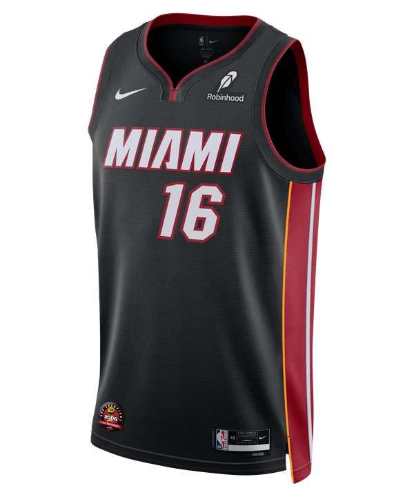 The Nike Keshad Johnson Miami HEAT Icon Black Youth Swingman Jersey features red and white MIAMI text, number 16, red and yellow side stripes, sponsor and Nike logos, and is made with Dri-FIT technology for comfort.