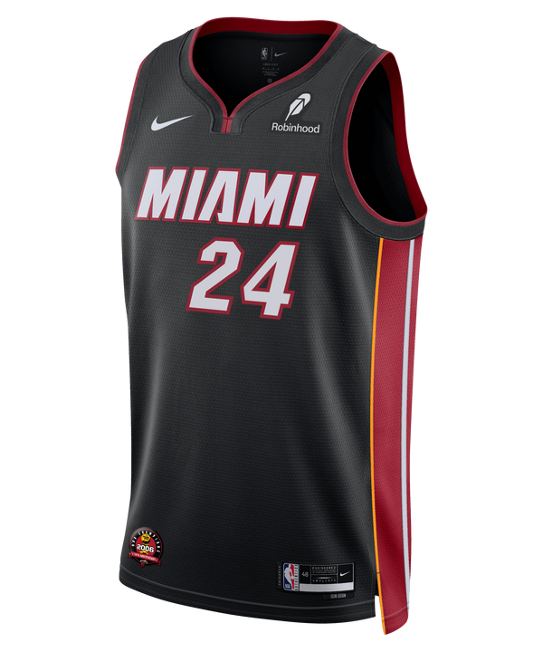 The Norman Powell Nike Miami HEAT Icon Black Swingman Jersey features red trim, yellow side accents, and the number 24 on the front. Made from polyester with Dri-FIT tech, it displays the Nike logo and Robinhood sponsor on the chest.