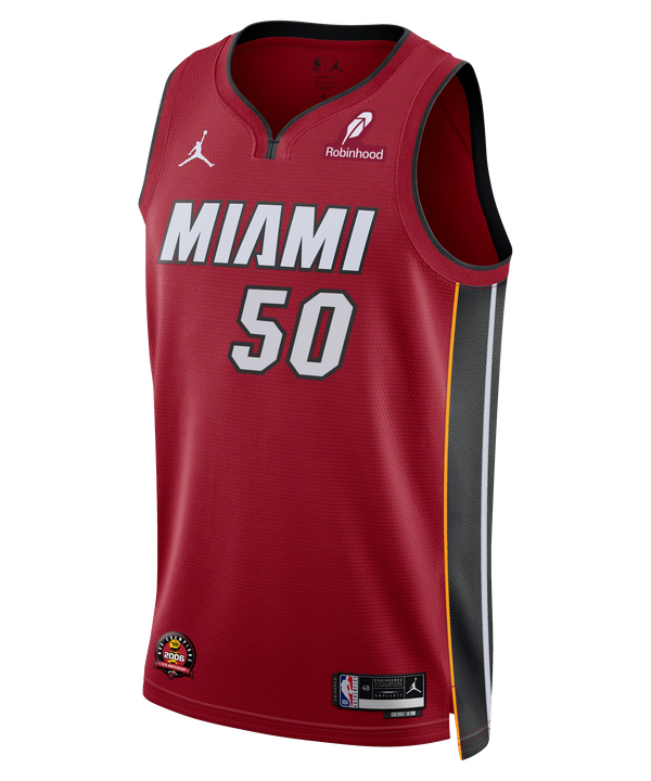 The Vladislav Goldin Nike Jordan Brand Miami HEAT Statement Red Swingman Jersey features #50, gray lettering, black/gold/gray side panels, NBA/Jordan/Robinhood logos, inspired by the bold Miami HEAT Statement Edition.