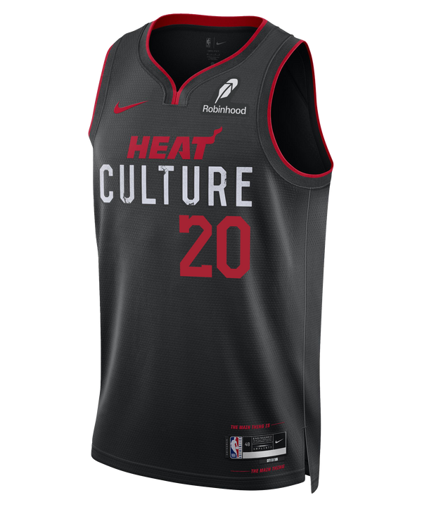 The Nike Keshad Johnson HEAT Culture Youth Swingman Jersey features a black design with red trim, number 20, Nike and Robinhood logos, and celebrates the Miami HEAT City Edition uniform.