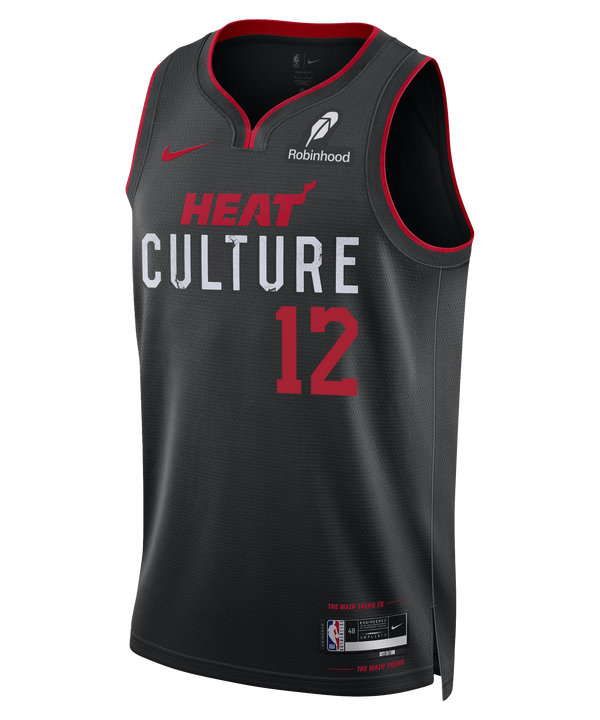 The Nike Dru Smith HEAT Culture Youth Swingman Jersey features a black Miami Heat design with red accents, number 12, Nike and Robinhood logos, an NBA logo tag by the hem—part of the City Edition uniform.
