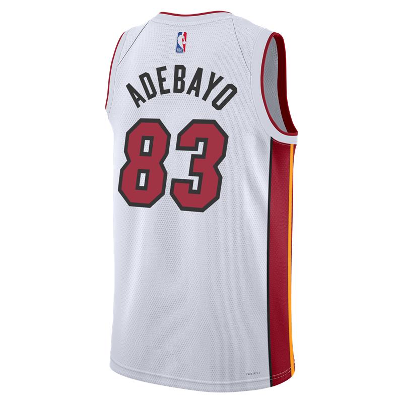 The Nike Bam Adebayo Miami HEAT Association White “83-Point Game” Swingman Jersey features ADEBAYO and number 83 on the back, red/yellow side panels, and a 2006 NBA Championship patch.