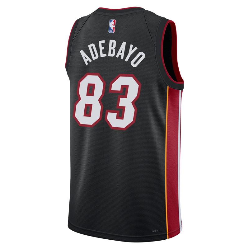 The Nike Bam Adebayo Miami HEAT Icon Black “83-Point Game” Swingman Jersey features red trim, ADEBAYO and number 83 in bold white with red outline on the back, and the NBA logo at the top.