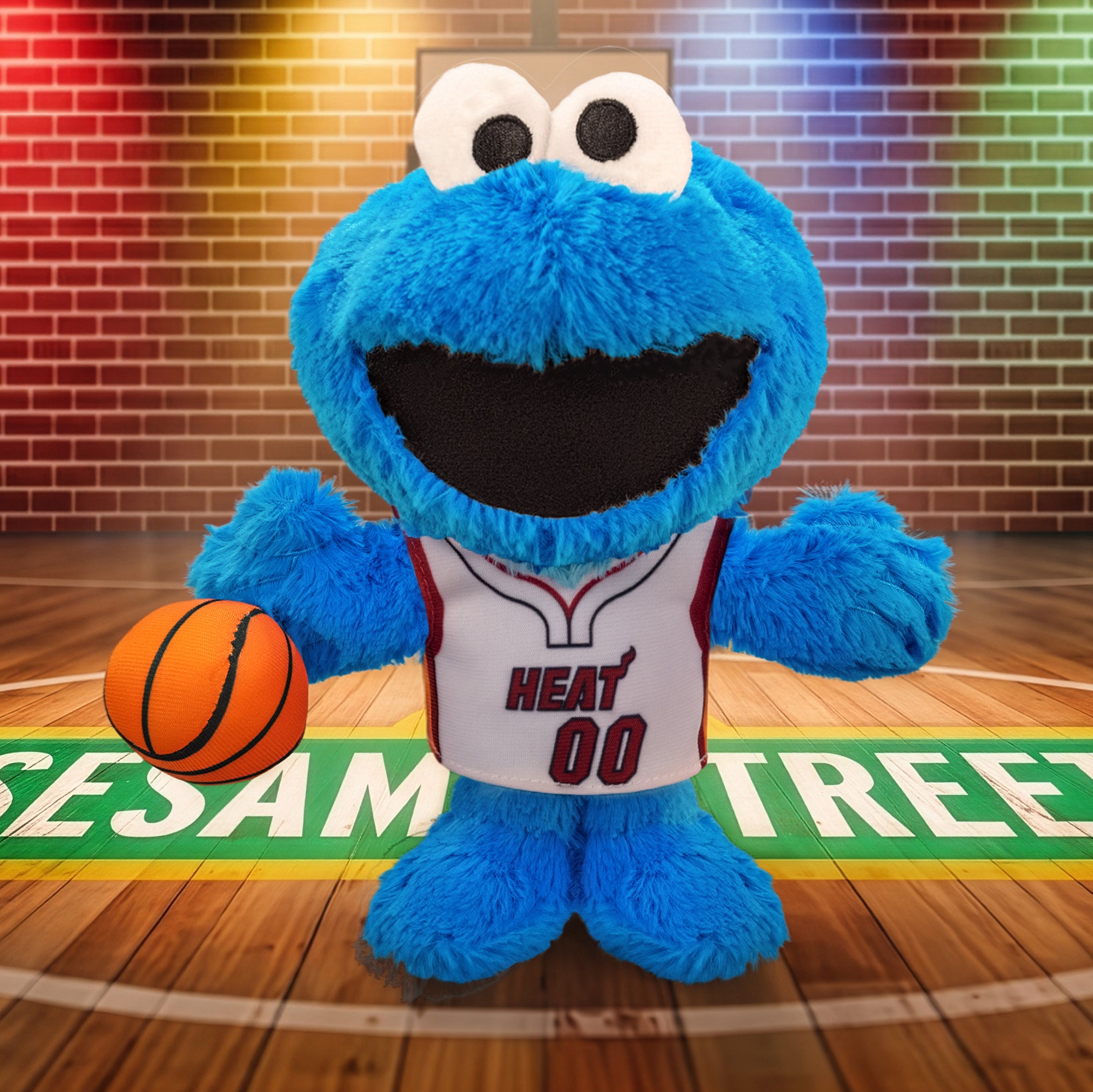 The Bleacher Creatures Miami HEAT Cookie Monster Association Plushie stands on a court with “Sesame Street” written on the floor, colorful lights in the background, and clutches a basketball with playful energy.