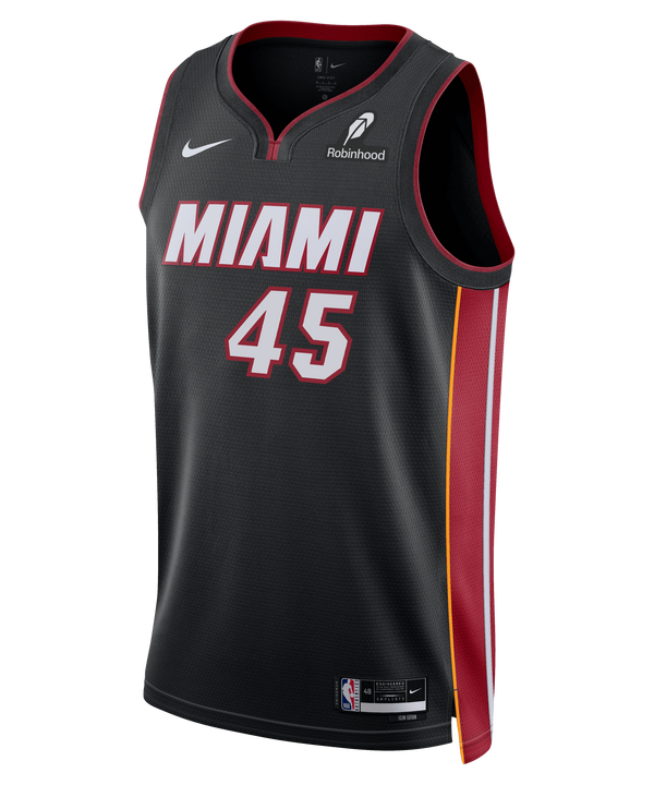 The Davion Mitchell Nike Miami HEAT Icon Black Swingman Jersey features red trim, white/red number 45, Nike and Robinhood logos, Dri-FIT moisture-wicking tech, red/yellow side stripe, and NBA logo at the hem.
