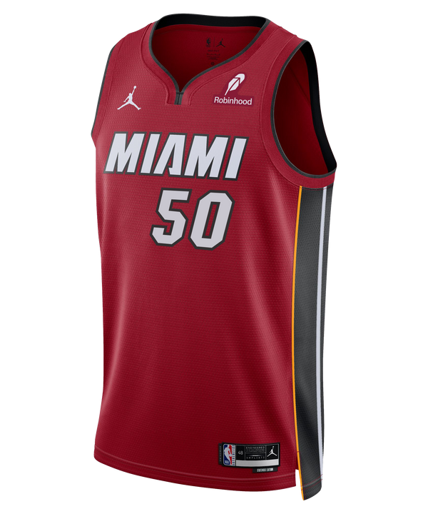 The Vladislav Goldin Nike Jordan Brand Miami HEAT Statement Red Swingman Jersey features number 50 in gray, Dri-FIT moisture-wicking tech, white and black side panels, sponsor logos, plus black and gold trim on the armholes and collar.