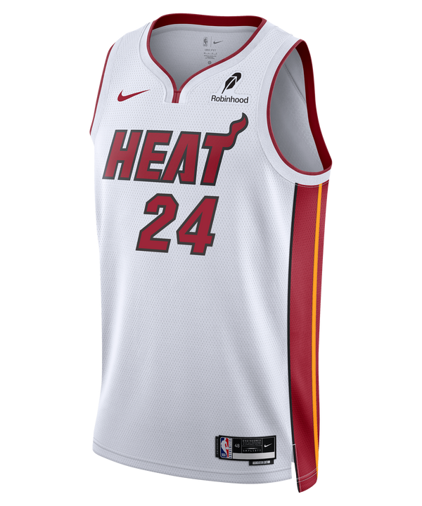 The Nike Norman Powell Miami HEAT Association White Swingman Jersey features bold HEAT lettering, number 24, red accents, yellow and red side stripes, Robinhood logo, and moisture-wicking Dri-FIT tech for comfort.