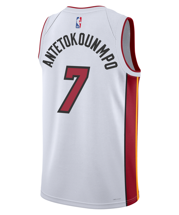 The Nike Giannis Antetokounmpo Miami HEAT Association Youth Swingman Jersey is white with red/yellow side panels, features number 7, bold red HEAT lettering, team details, and Robinhood and Nike sponsor logos.