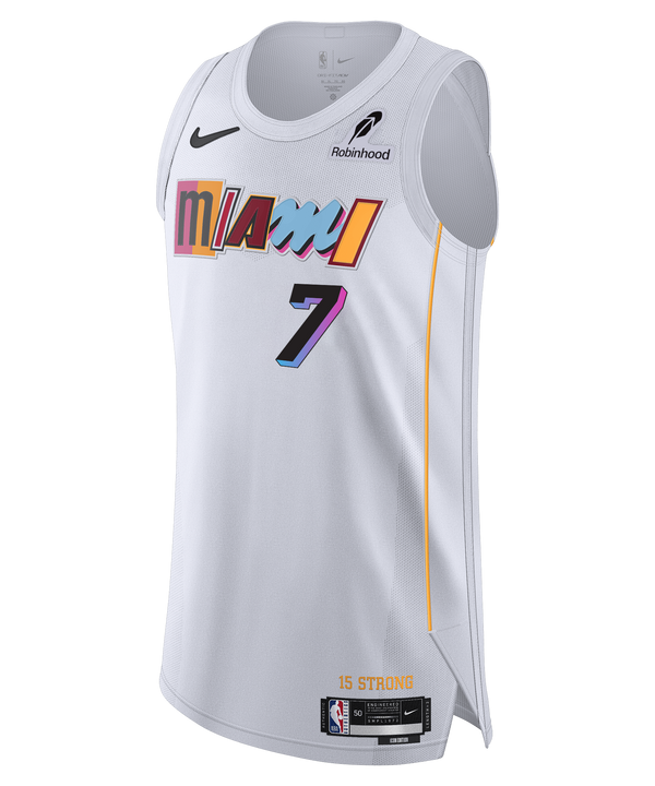 Giannis Antetokounmpo Nike Miami Mashup Vol. 2 Authentic Jersey by Nike features a white design with colorful Miami text, number 7, sponsor logos, and yellow side accents. Bold twill team and player details stand out along with a classic striped knit armhole for added style. The words “15 STRONG” appear above the NBA jock tag near the bottom hem.