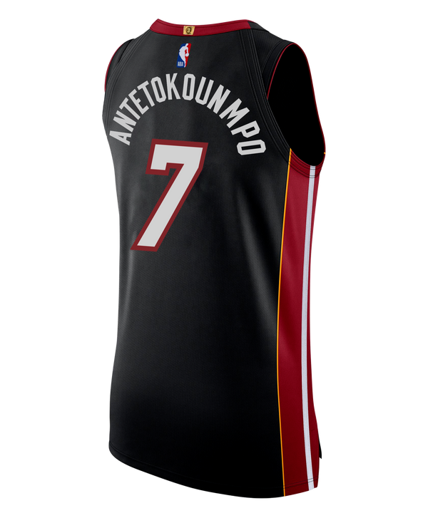Show your team pride with the Giannis Antetokounmpo Nike Icon Black Authentic Jersey, featuring bold red and white “MIAMI” lettering, number 7 detailing, and striking red/yellow side stripes. This officially licensed Nike jersey includes both Nike and Robinhood logos, an NBA tag at the hem, and durable twill team graphics for an authentic look. Made from a machine-washable striped knit fabric, it offers both style and easy care for game day excitement.