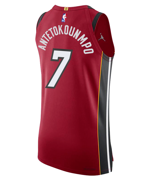 The Giannis Antetokounmpo Nike Jordan Brand Miami HEAT Statement Red Authentic Jersey showcases the number 7, bold white MIAMI lettering, black and yellow side stripes, NBA and Jordan logos, a Robinhood sponsor badge, and premium twill team details for a true pro game day look.