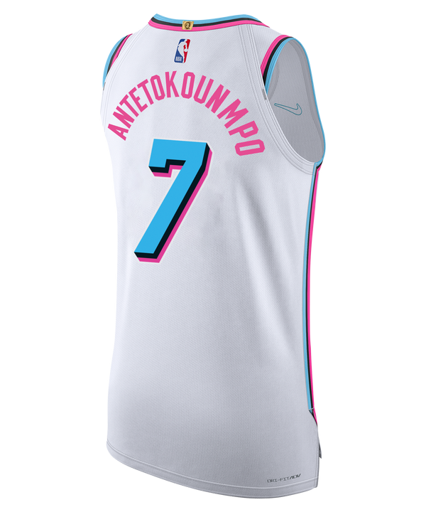 Introducing the Giannis Antetokounmpo Nike Original Vice Authentic Jersey—a white basketball jersey featuring pink and blue accents, “Miami” in vibrant pink script, a blue number 7, twill team details, and both Nike and Robinhood logos. Finished with an NBA Authentics tag at the hem and crafted in a striped knit jersey style for true pro game day appeal.