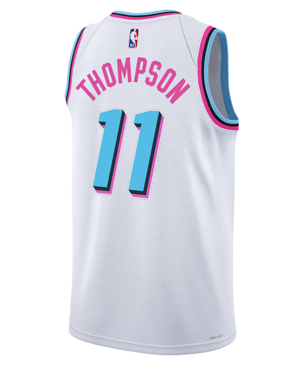 A Klay Thompson Nike Original Vice Swingman Jersey in white, featuring pink and blue accents, “Miami” in stylized script, number 11, and sponsor logos from Nike and Robinhood, displayed on a plain white background. This NBA jersey by Nike captures the bold flair of the City Edition uniform collection.