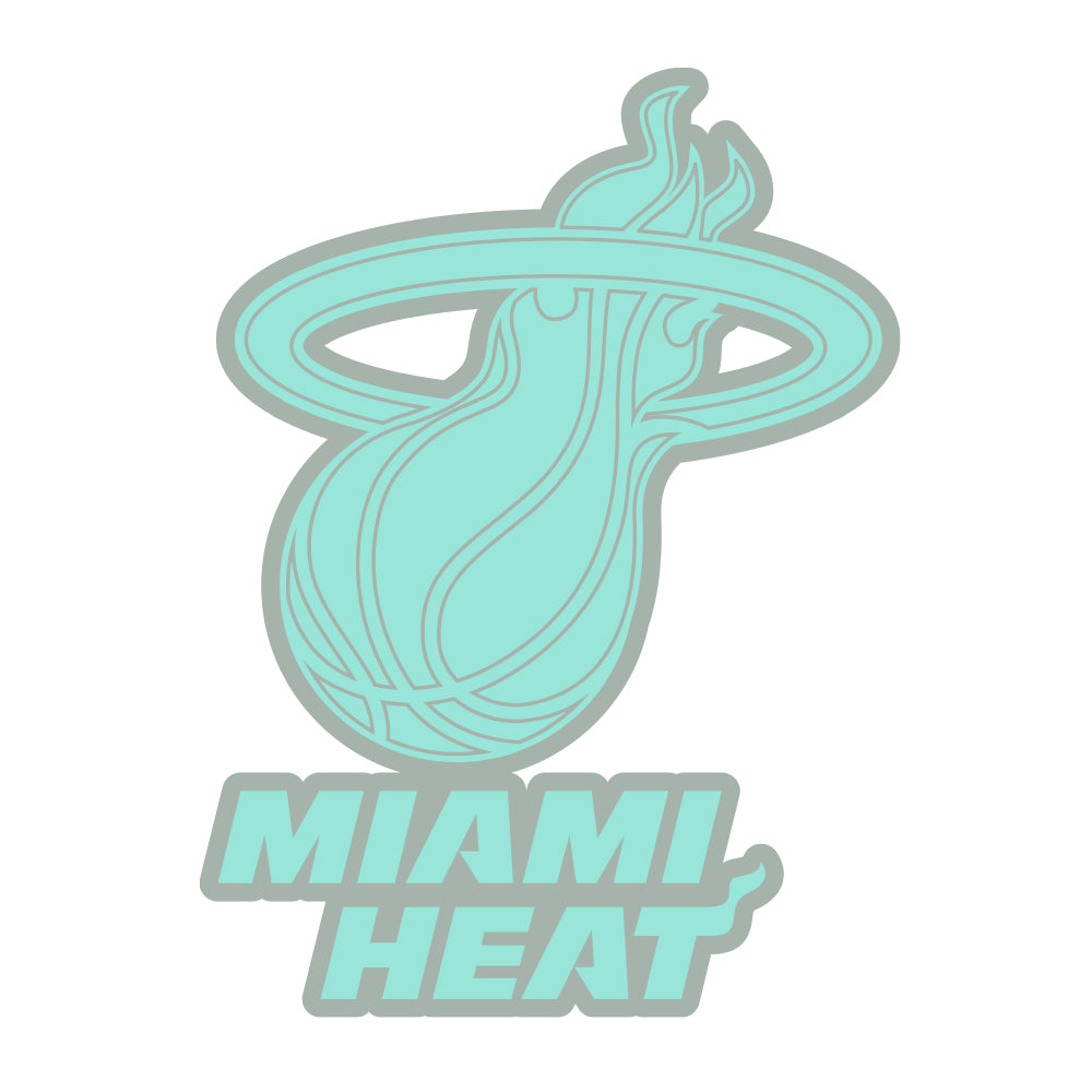 The Pro Specialties Miami HEAT Glow In The Dark Pin features the team's pastel teal logo with a flaming basketball and bold lettering below, adding a unique glow for collectors and fans.